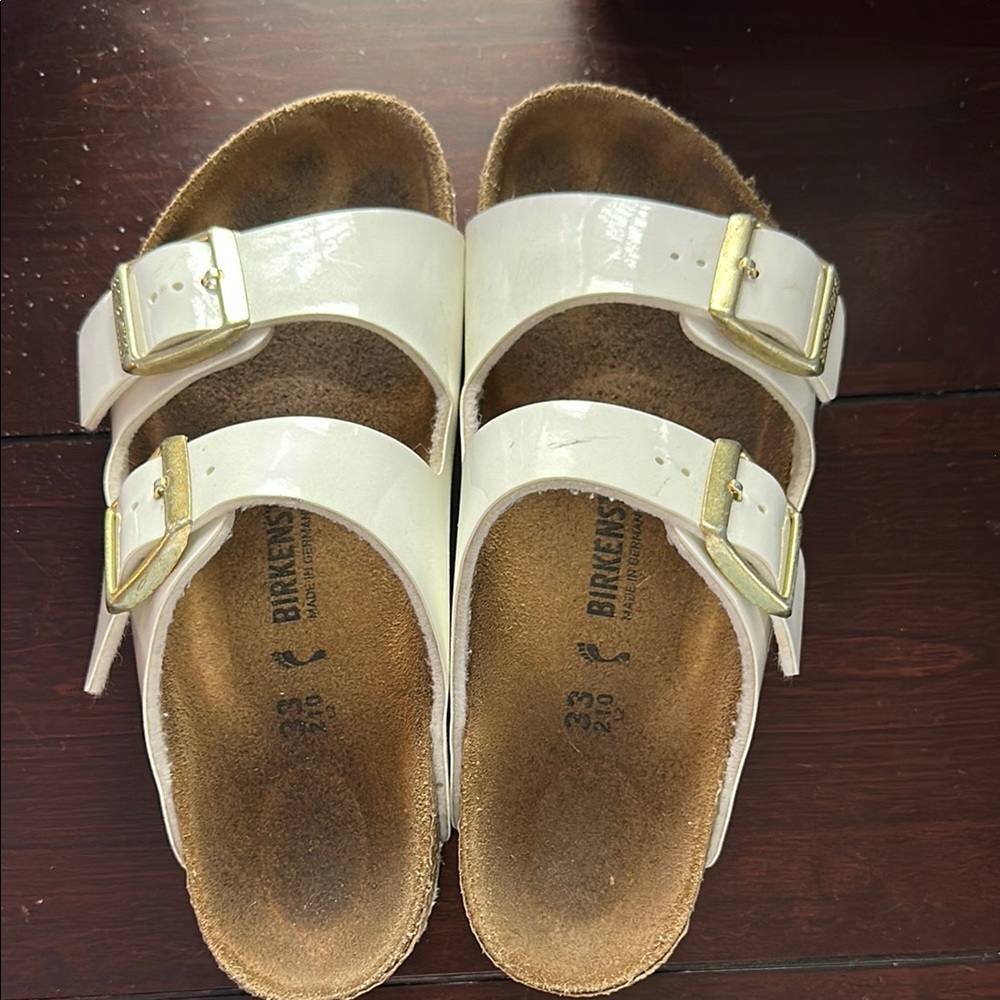 White Sandals with Gold Buckles